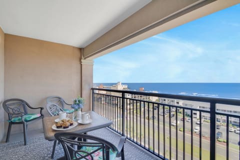 Sip your morning coffee while taking in sweeping ocean views from your private balcony with comfortable seating.