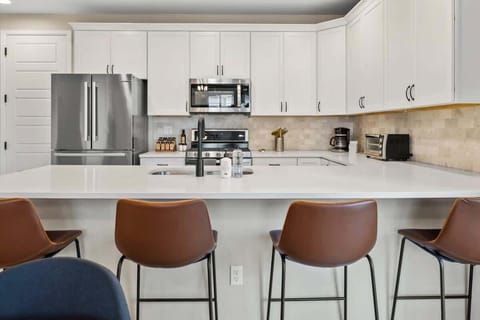 Bar-style seating at the kitchen counter