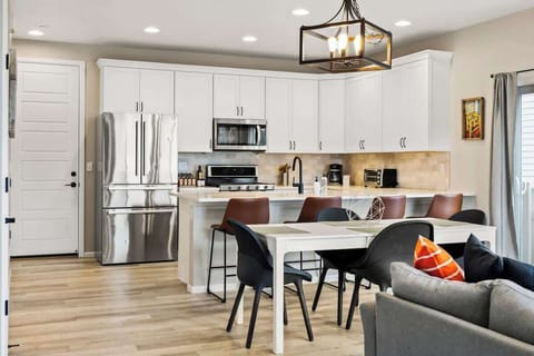 Main level living and dining areas with kitchen
