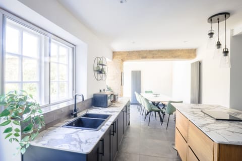 Open plan kitchen/dining area- fully equipped with Oven, hob, dishwasher, microwave Coffee machine