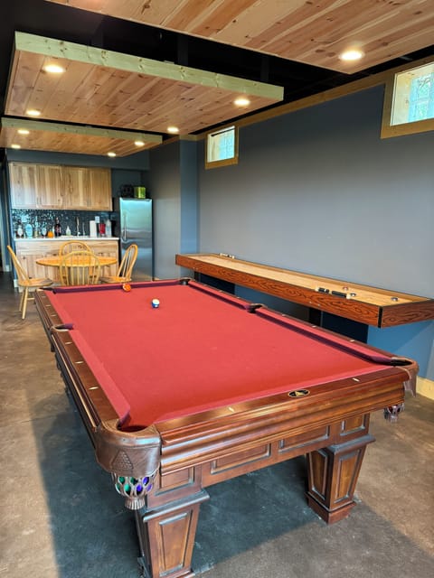 Pool and shuffle board tables on lower level