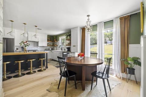 Dining area beside the kitchen with seating for group meals and gatherings