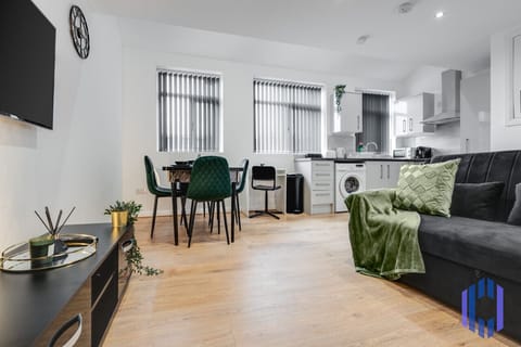 Living room  - 50'  Smart TV loaded with Netflix, ambient lighting,  extra fast Wi-Fi - Complimentary tea & coffee available for your enjoyment