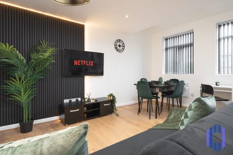 Living room  - 50`  Smart TV loaded with Netflix, ambient lighting,  extra fast Wi-Fi - Complimentary tea & coffee available for your enjoyment