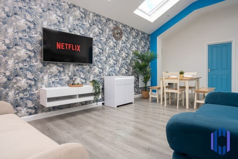 Living room  - 50`  Smart TV loaded with Netflix, ambient lighting,  extra fast Wi-Fi - Complimentary tea & coffee available for your enjoyment