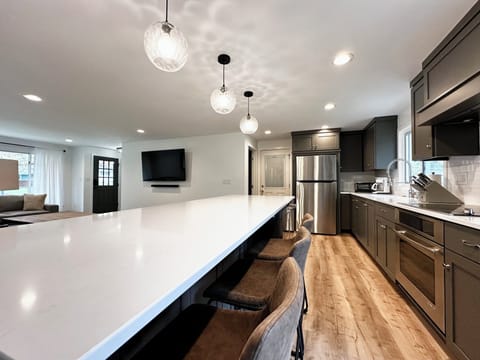 Main floor open concept kitchen and living room area