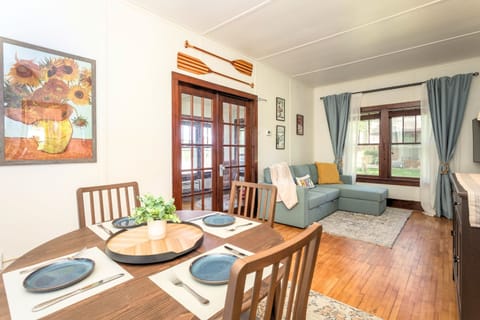 The Main Cottage dining area and living room