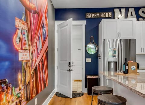 Main Entrance with 3 Barstools around Island