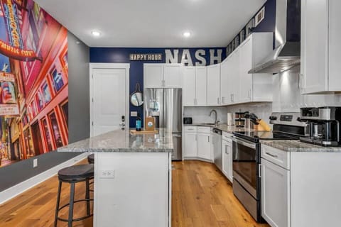 Main Entrance with 3 Barstools around Island