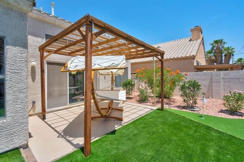 Unwind in our shaded hammock area with lush garden views.
