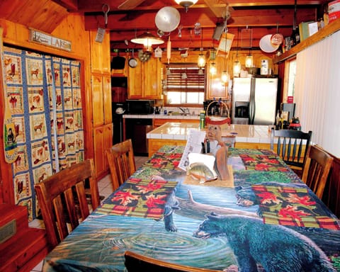 full kitchen with dining table 