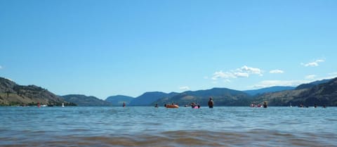 Skaha Lake! Steps from the front door, you and your family will love it here.