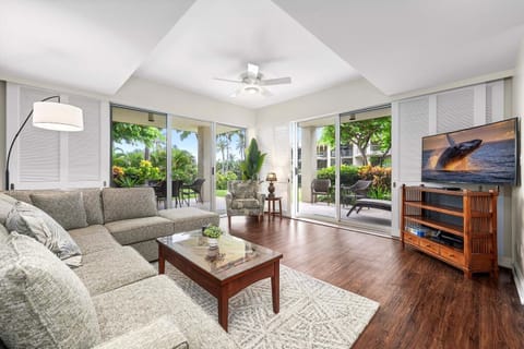 Spacious living room with views of wrap around porch