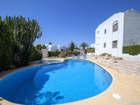Water, Sky, Building, Plant, Property, Blue, Window, Azure, Swimming Pool, Tree