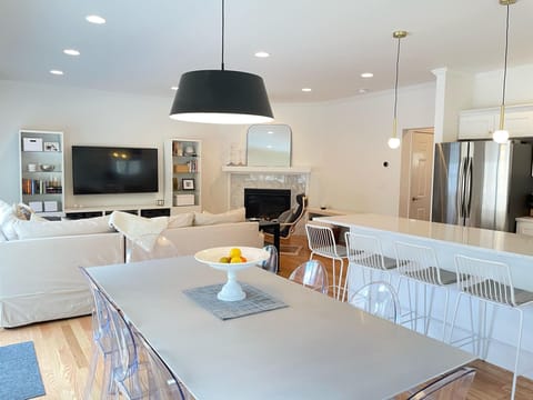 Main floor living, kitchen, and dining area