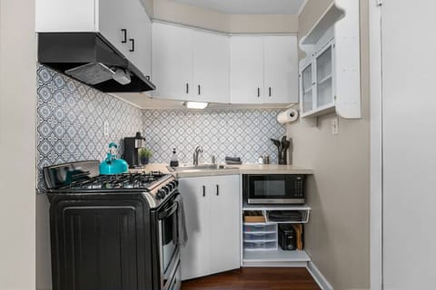 The kitchen is stocked with everything you need for preparing meals.