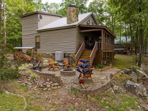 Fire Pit in the side yard of A Bear`s Lair. Wood Burning Fire Pit with Complimentary Firewood.
