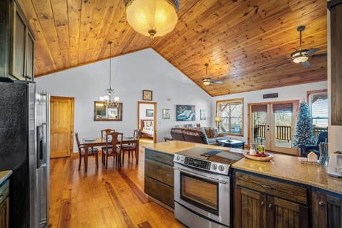 A well-appointed kitchen designed for cooking, with the stovetop oriented toward the stunning scenery outside.