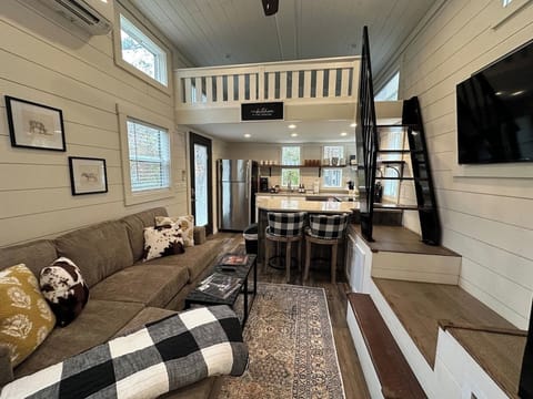 Thoughtfully designed open-concept living and kitchen area.