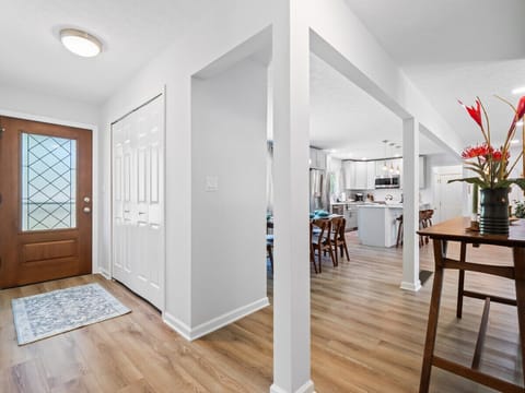 Our spacious hallway guides you seamlessly into the open-concept living and kitchen space, designed for modern comfort and style.