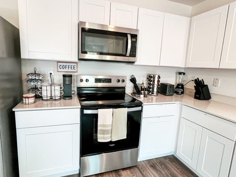 Kitchen and complimentary coffee bar