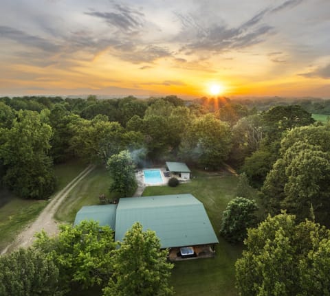 Aerial view of our 10 Acres of Land with a main house and 6 airstreams for your group to enjoy!