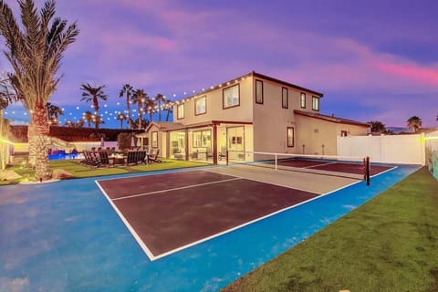 Challenge your friends to a match on the private pickleball court as the sun sets