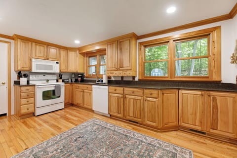 Our well-appointed kitchen has everything you need to make even the grandest of meals. Look at all that counter space!