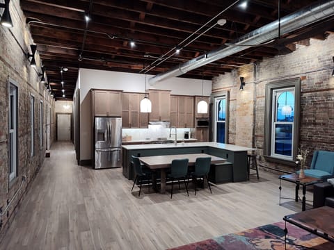 Spacious industrial loft living/kitchen area