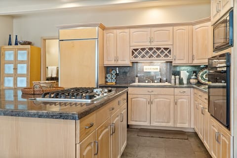 Kitchen: Drip coffee maker, Keurig, Crockpot, cooking utensils, tableware