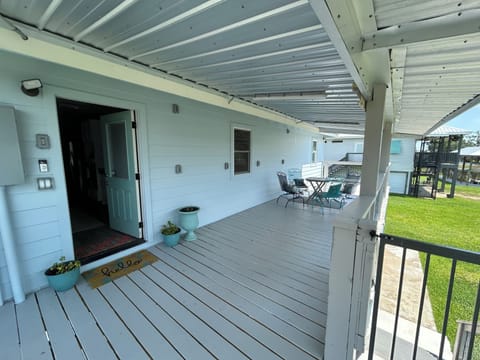 Large deck with view of water and outside    dock