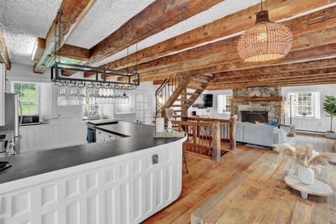 Elegant bar table with wine glasses – perfect for an evening of relaxation and conversation.