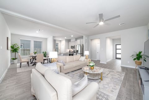 Enjoy the comfort of this super spacious and cozy living room, with plenty of room to relax and unwind.