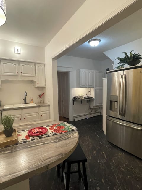 Large open kitchen flows into dining room
And living-room.