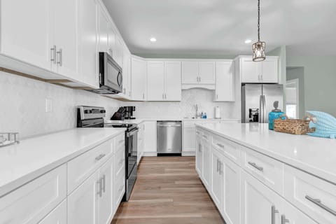 Savor the convenience of a modern kitchen, fully equipped for all your culinary needs!