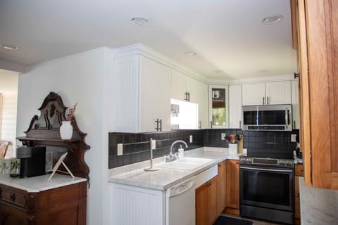 This kitchen seems to have everything. Including an airfryer.