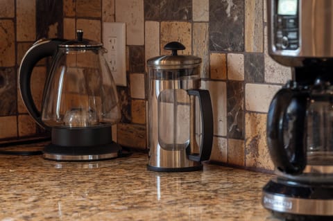 - Coffee maker and French press on granite counter   - Enjoy fresh morning coffee during your stay   - Kitchen stocked with essentials for guest comfort