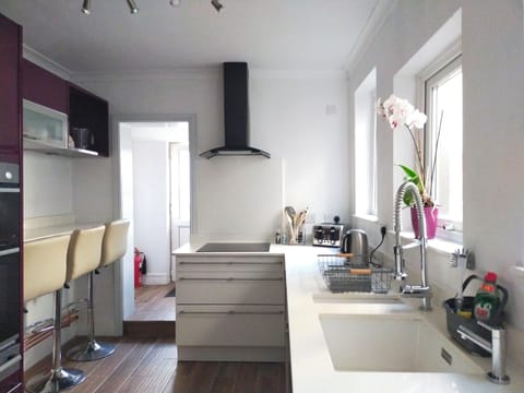 Fully equipped Kitchen with microwave, kettle, coffee maker, blender and toaster