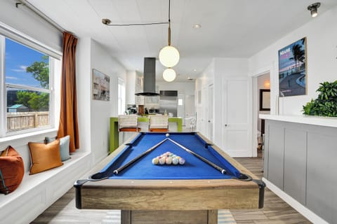 Pool table near the kitchen 