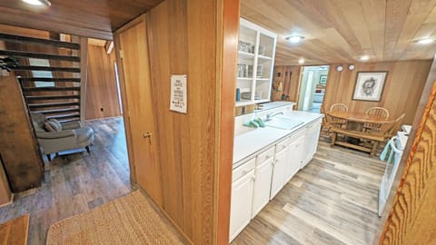 Across from the laundry, to the right from the entry is the Kitchen