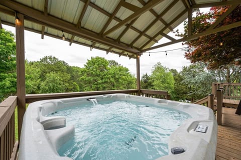Unwind in the soothing hot tub after an exhilarating day of exploring the mountains! Let the warm, bubbling water melt away any tension as you relax under the open sky!