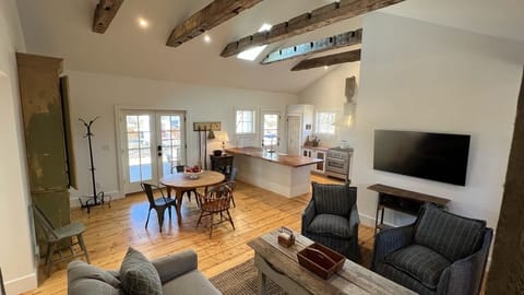 Open Floor Plan - Exposed Hand Hewn Beams - Pure Comfort 