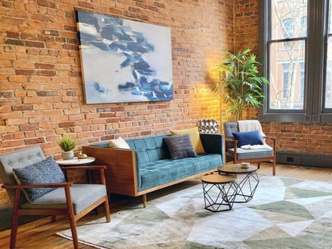 A cozy space with 12’ ceilings looking upon the downtown area.
