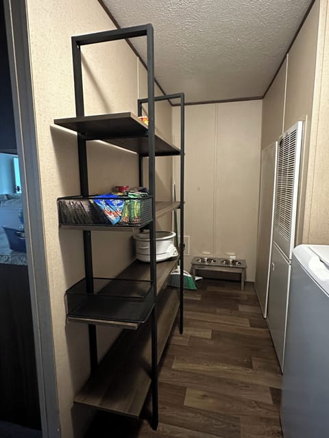 Extra food storage with a full size washer and dryer. 
Pet bowls