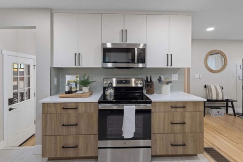 The kitchen is always stocked with dishes, utensils, silverware and cookware.