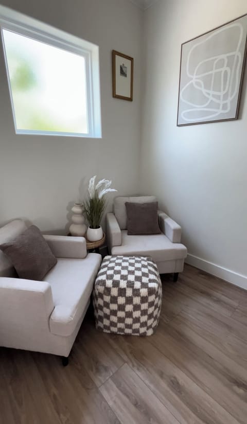 Plush seating at the area near the stairs