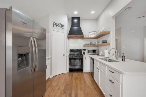 Fully stocked kitchen with coffee bar!