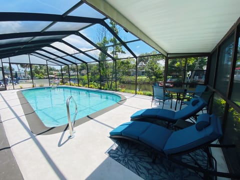 Enjoy the tranquillity of the canal while swimming in your private pool