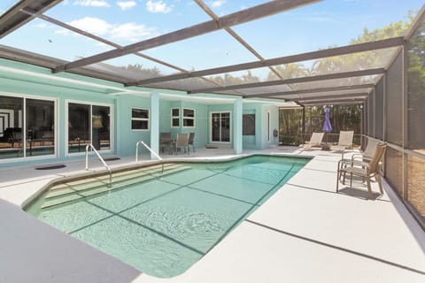 Shallow and deep ends of the pool and oversized lanai