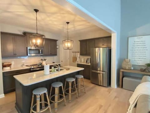 Full kitchen w/ pantry, LG fridge with ice maker, microwave, range & dishwasher.